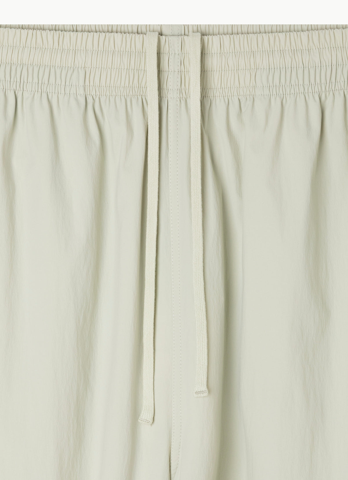 Diagonal jogger pants (Nylon ver.) (Unisex)_Celadon Tint