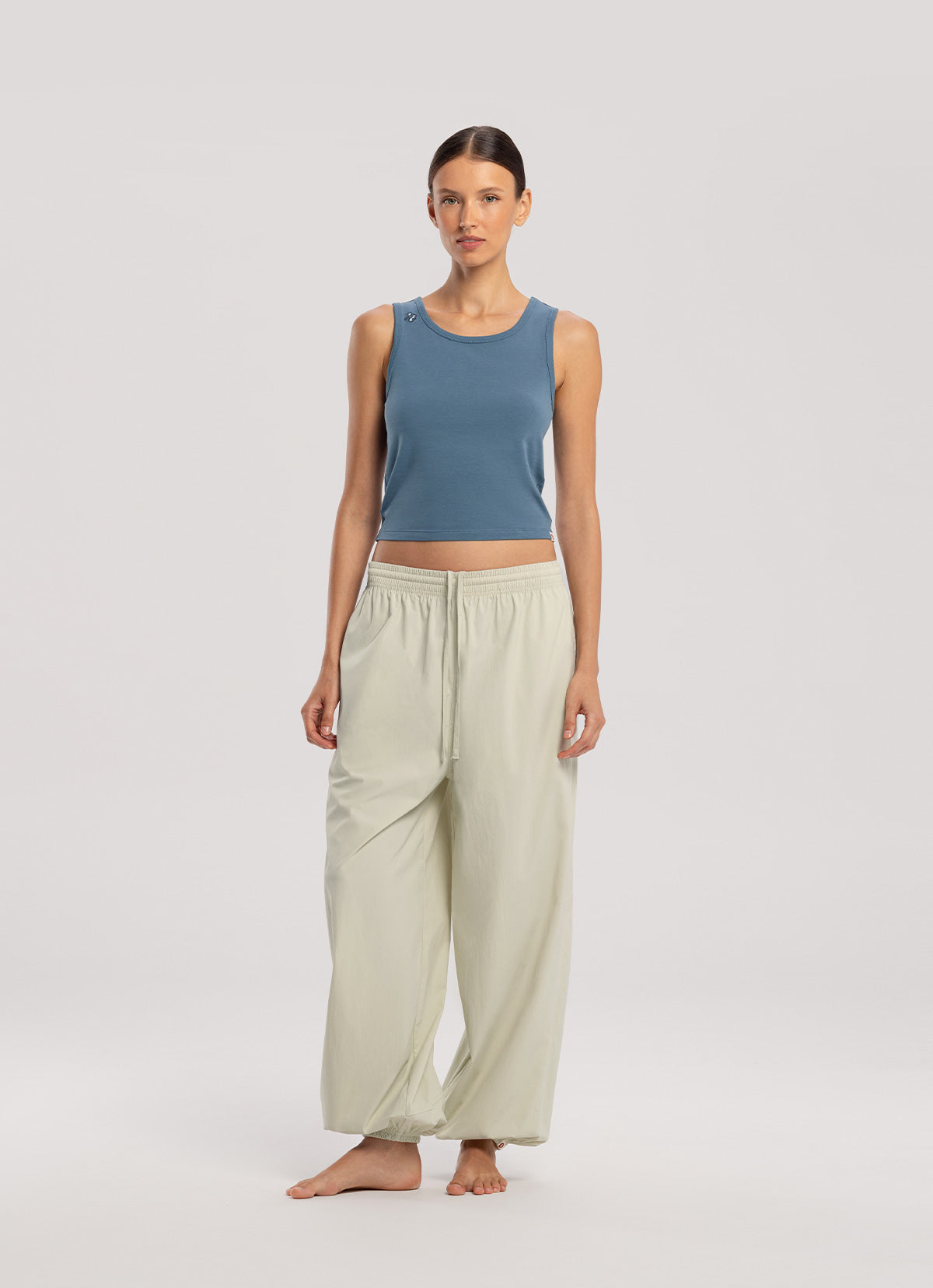 Diagonal jogger pants (Nylon ver.) (Unisex)_Celadon Tint