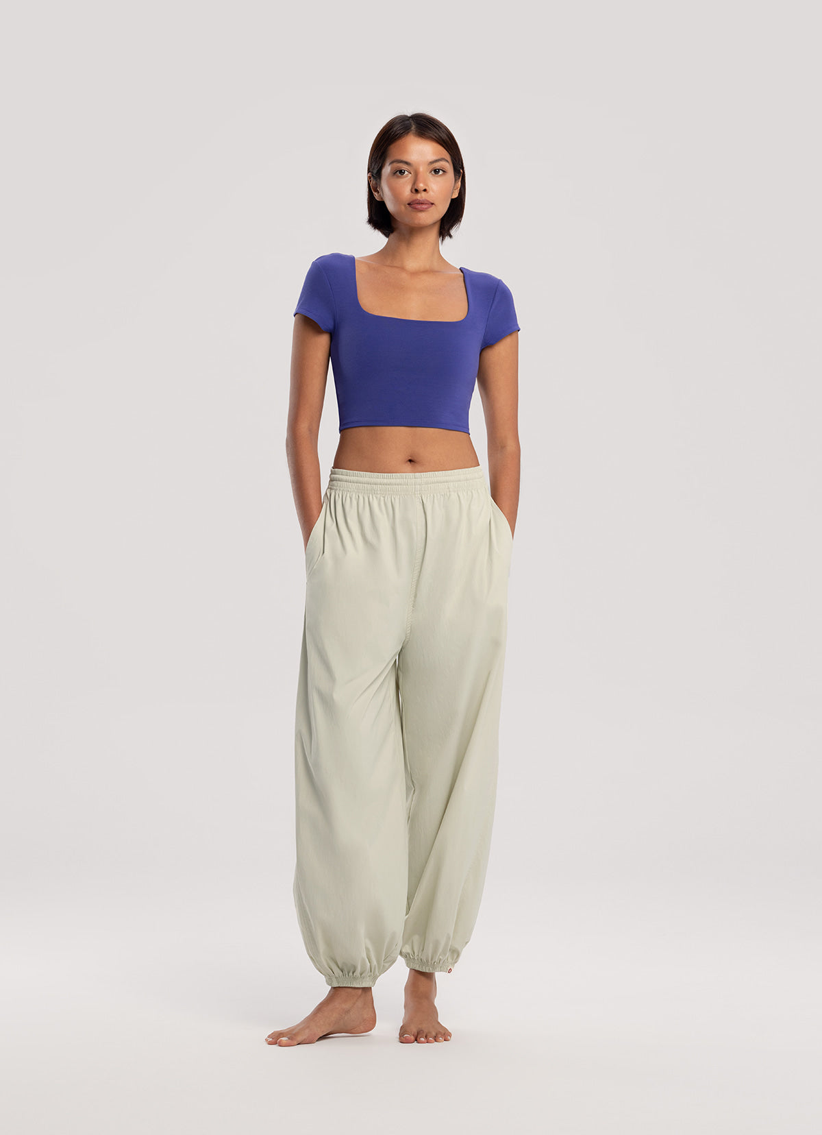 Diagonal jogger pants (Nylon ver.) (Unisex)_Celadon Tint